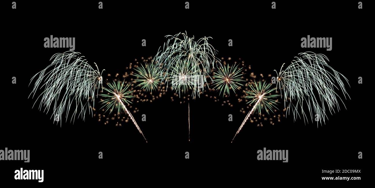 Beautiful green fireworks display isolated on black background for celebration and anniversary Stock Photo