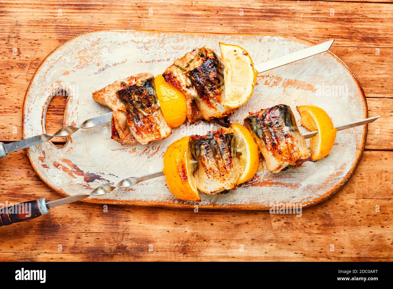 Grilled skewers of mackerel with lemon.Grilled fish kebab Stock Photo