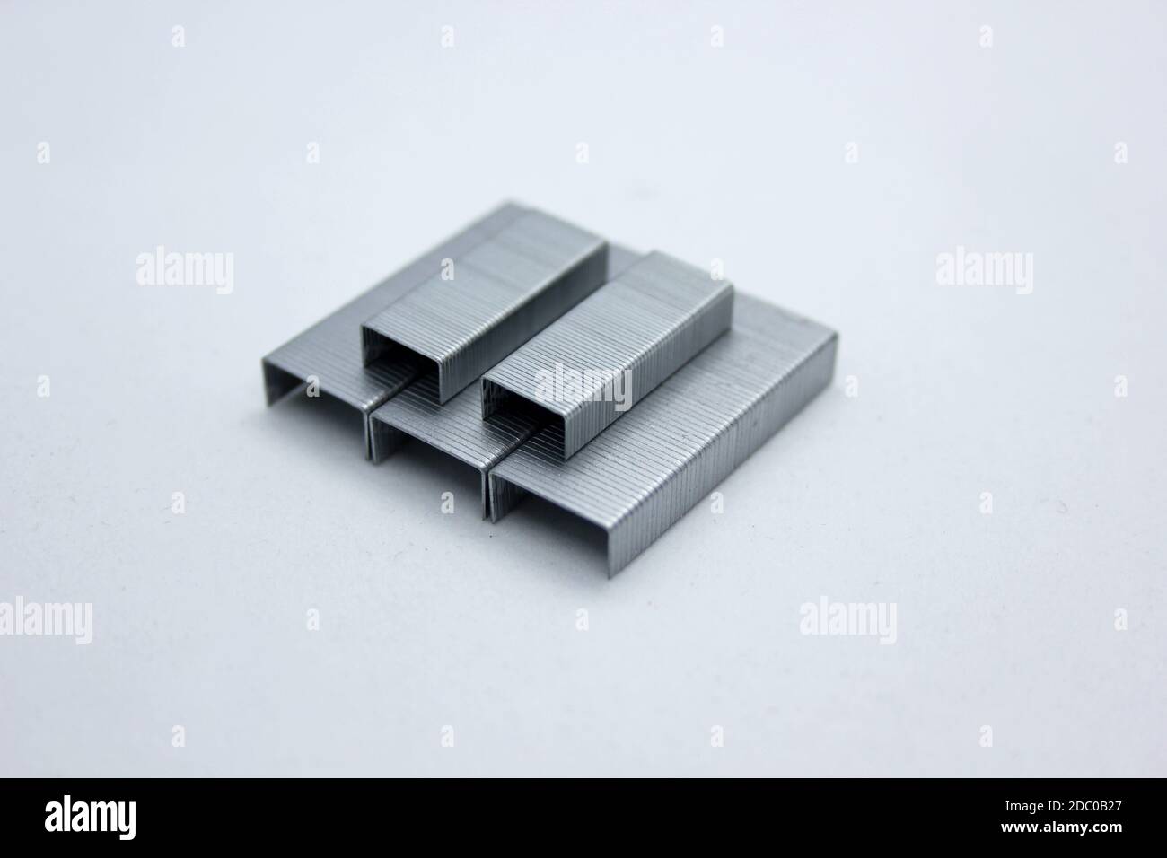 Metal staples for stapler isolated on white background Stock Photo