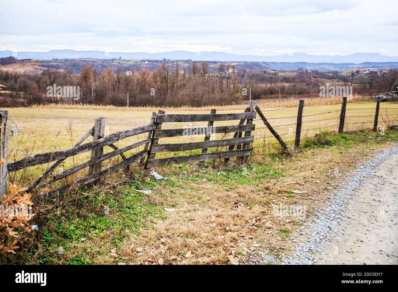 Wooden fence at farmland, autumn season, rural landscape Stock Photo ...