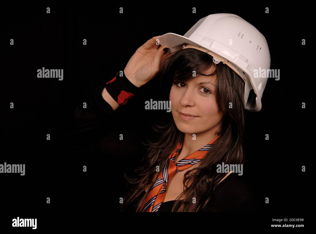 Young beautiful woman portrait on black background Stock Photo - Alamy