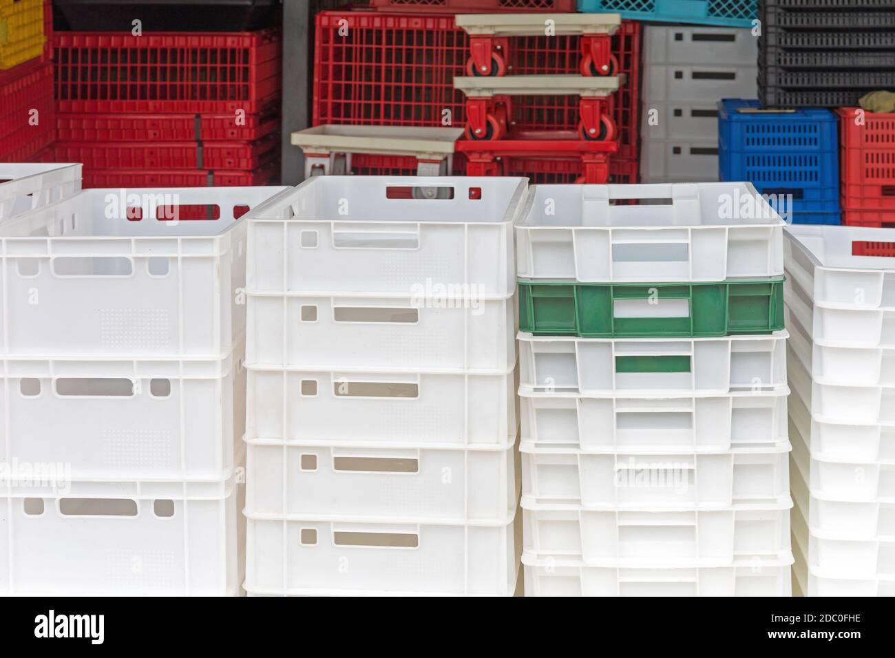 Stacked White Plastic Crates at Farm Stock Photo - Alamy