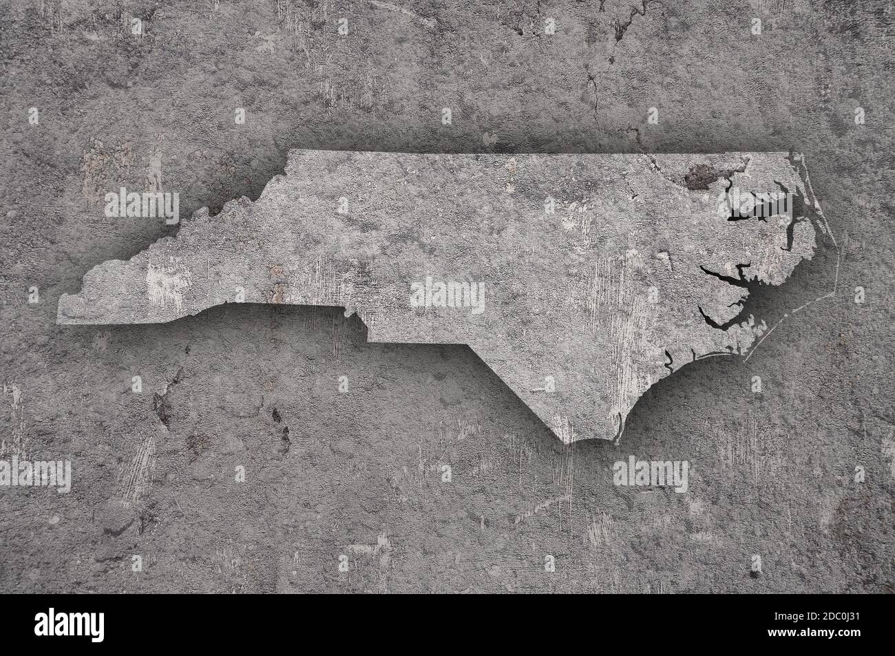 Map of North Carolina on weathered concrete Stock Photo Alamy