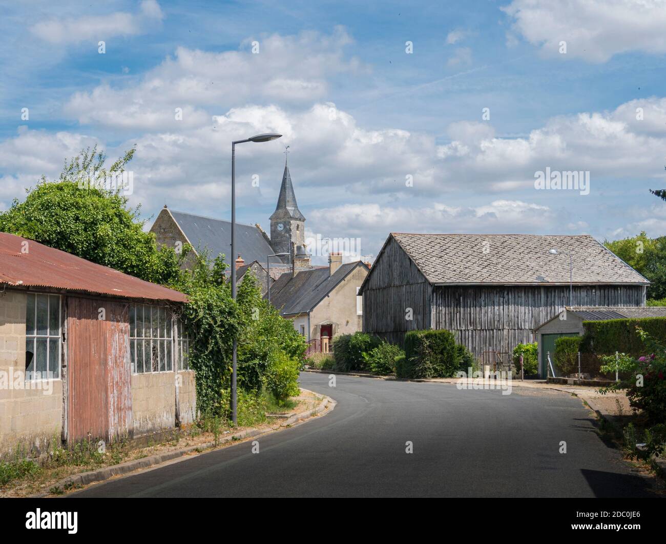 Street view entering a typical quiet French village, France Stock Photo