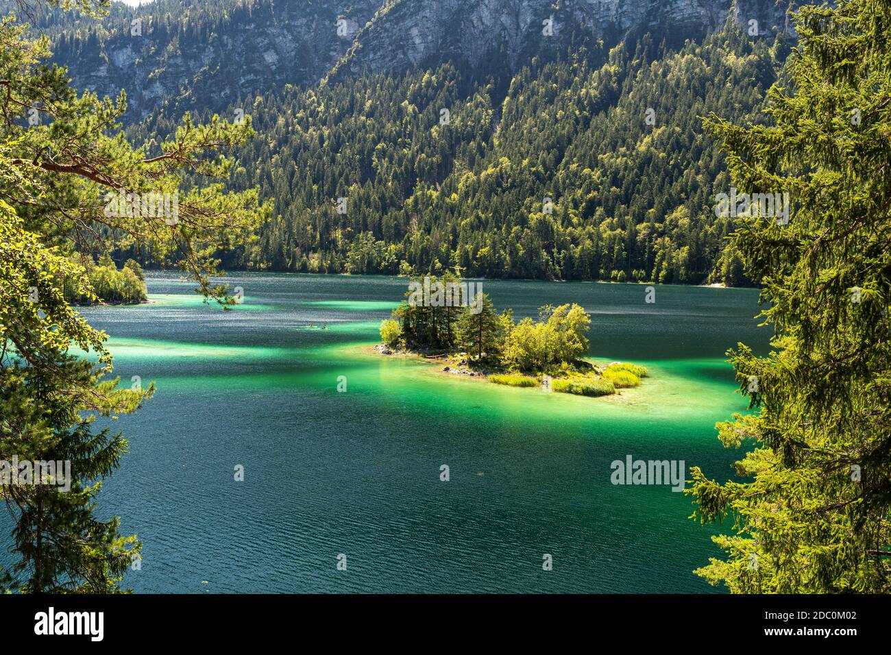 view on beautiful island in the eibsee in front of the zugspitze ...