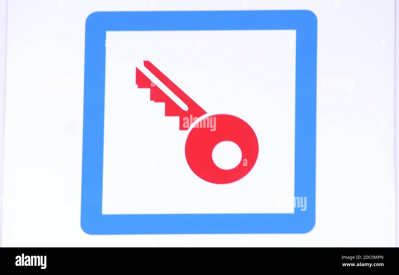 red key sign in a blue square on white background Stock Photo Alamy