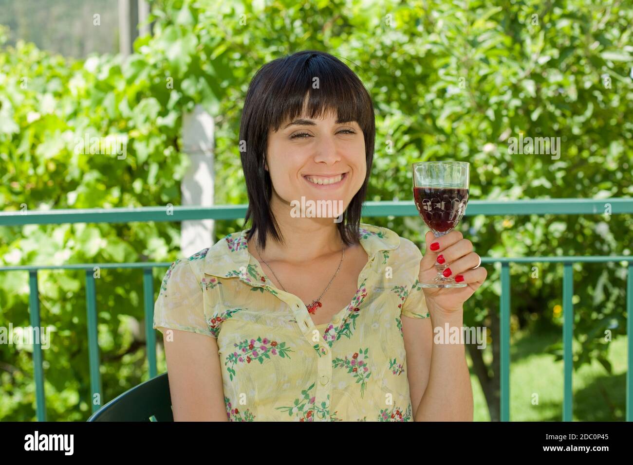 woman drinking red wine in a vineyard, outdoor Stock Photo Alamy