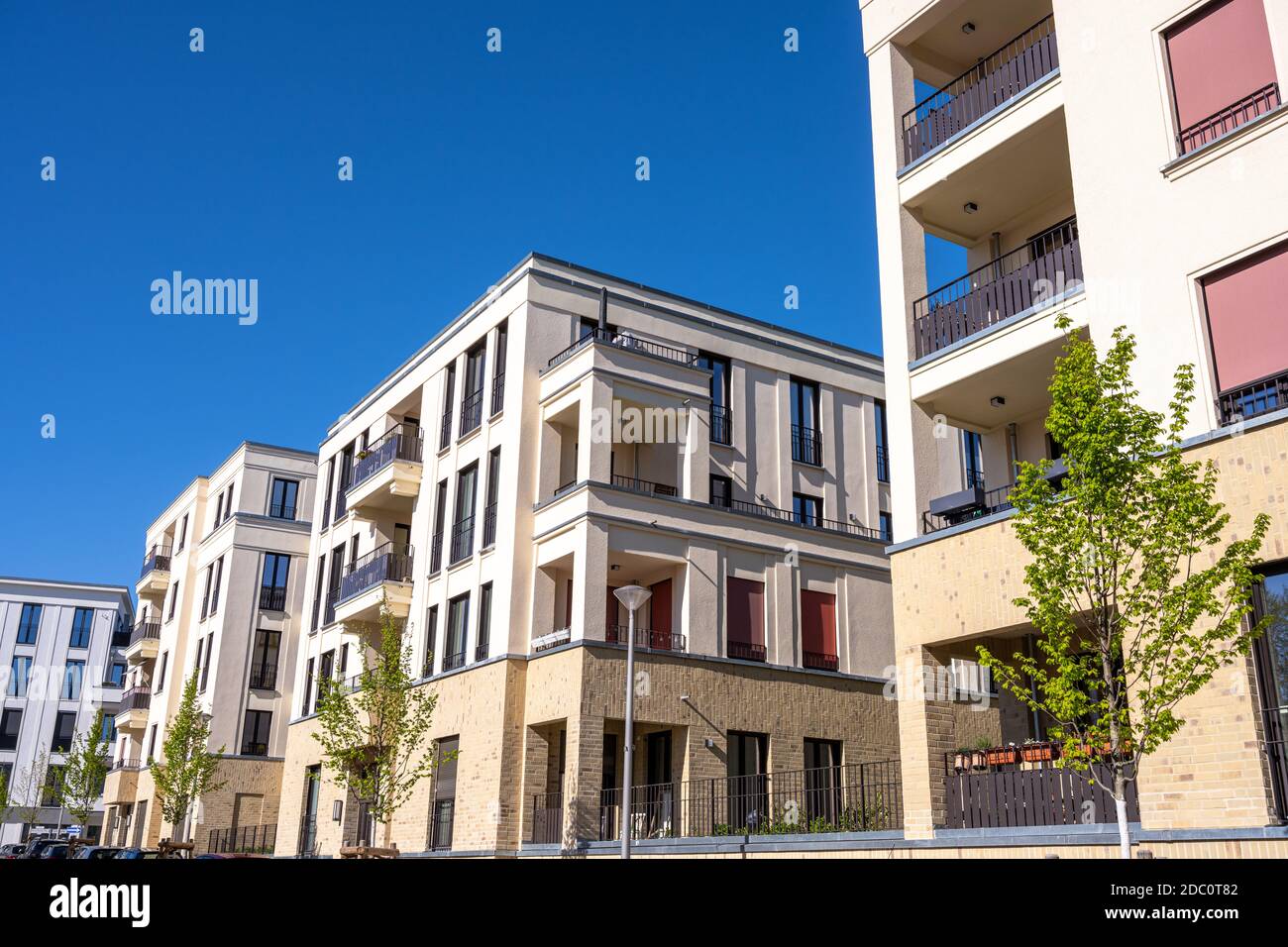 Modern beige tenement buildings seen in Berlin, Germany Stock Photo