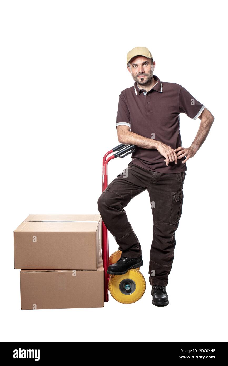 delivery man with handtruck and parcel isolated on white Stock Photo