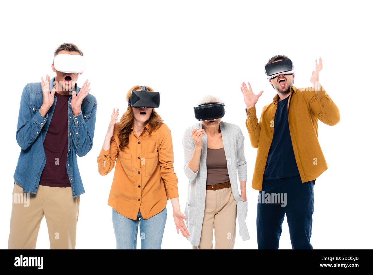 Excited friends using vr headsets isolated on white Stock Photo