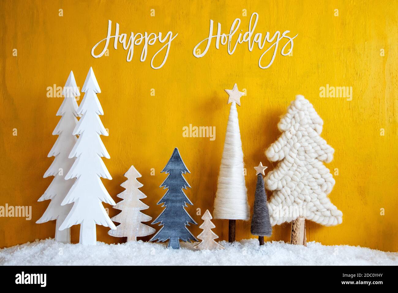 Christmas Trees With English Calligraphy Happy Holidays Yellow Wooden Rustic Background With Snow Christmas Decoration With Stars Stock Photo Alamy