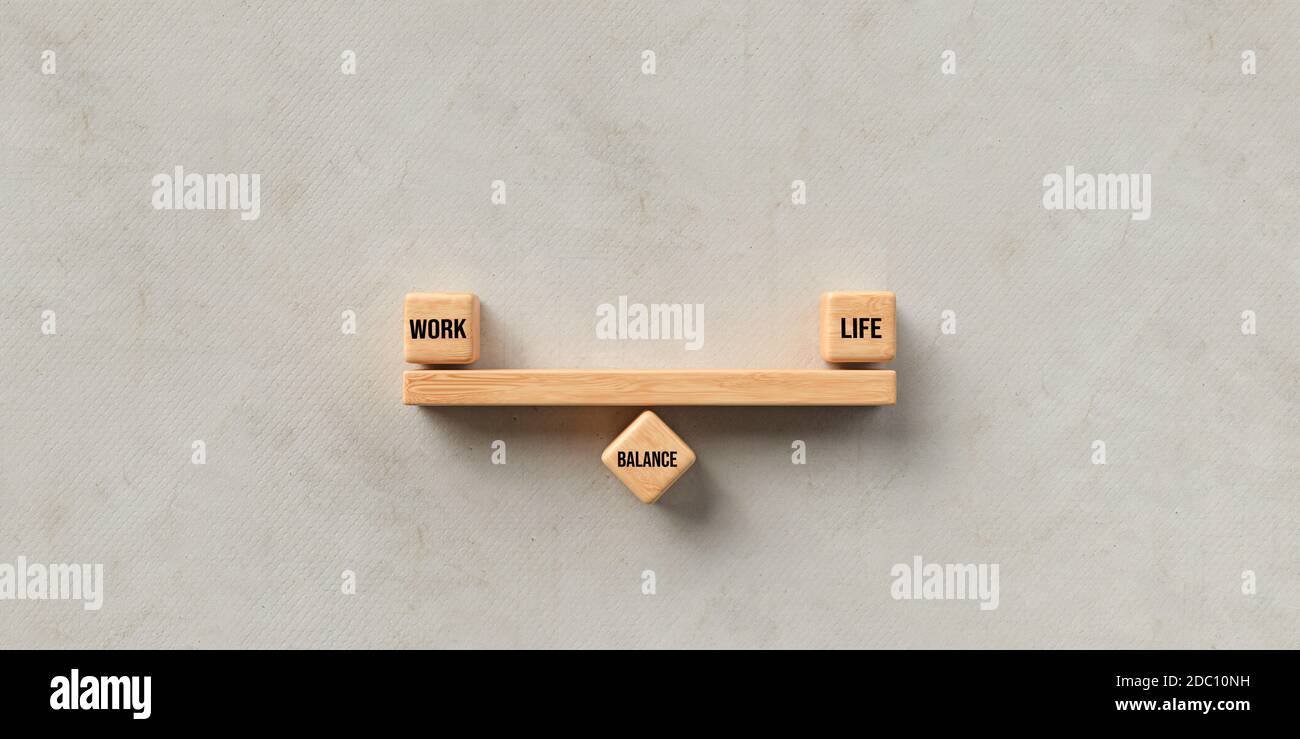 cubes forming scale with the words WORK, LIFE and BALANCE on wooden ...