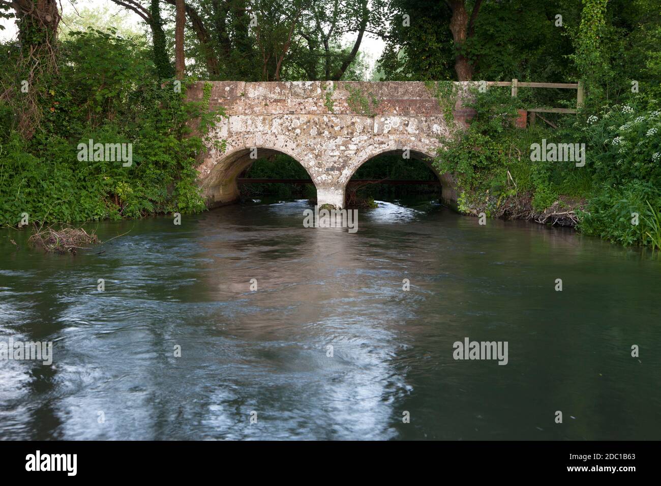 A bridge on the River Ebble at Homington near Salisbury in Wiltshire. Stock Photo