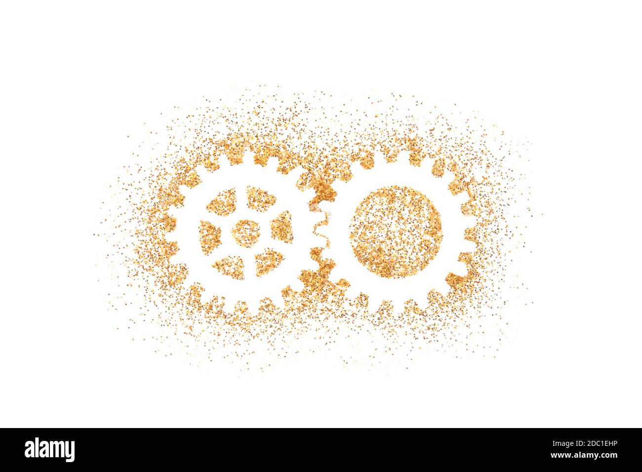 Two gears shape on golden glitter isolated on white background Stock Photo