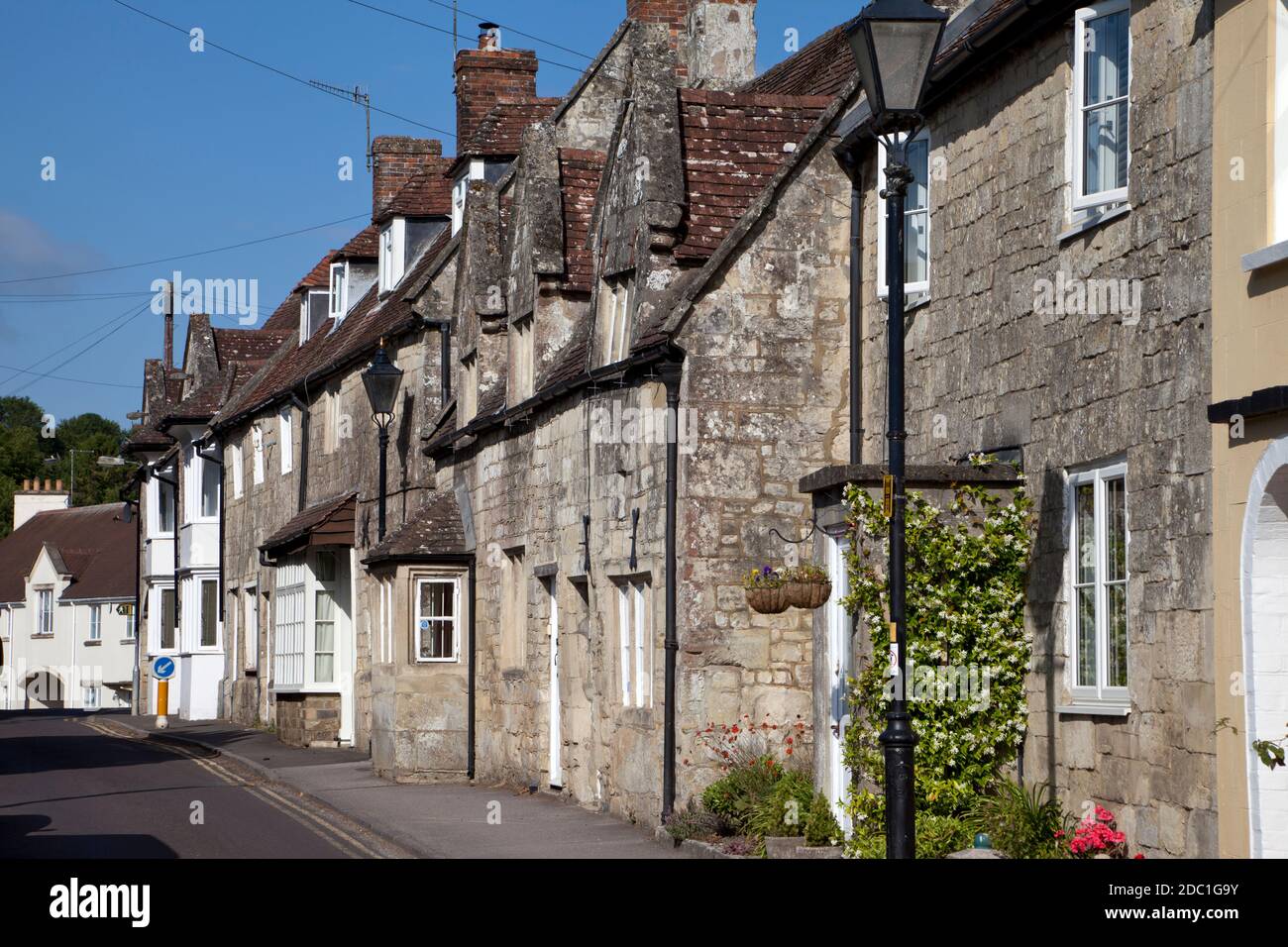 Terraced cottages in Church Street in Tisbury, Wiltshire. Stock Photo