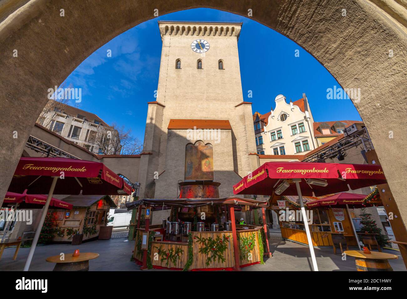 View of Valentin-Karlstadt-Museum and Christmas stalls through Isar Gate, Munich, Bavaria, Germany, Europe Stock Photo