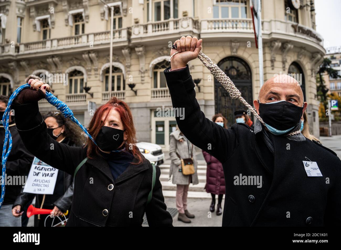 https://c8.alamy.com/comp/2DC1K01/madrid-spain-18th-nov-2020-people-wearing-black-clothes-and-a-rope-around-their-necks-during-a-protest-in-front-of-the-spanish-parliament-to-demand-urgent-aid-for-travel-agencies-and-tour-operators-a-sector-that-has-been-hit-hard-by-the-coronavirus-covid-19-pandemic-as-tourism-is-closed-credit-marcos-del-mazoalamy-live-news-2DC1K01.jpg