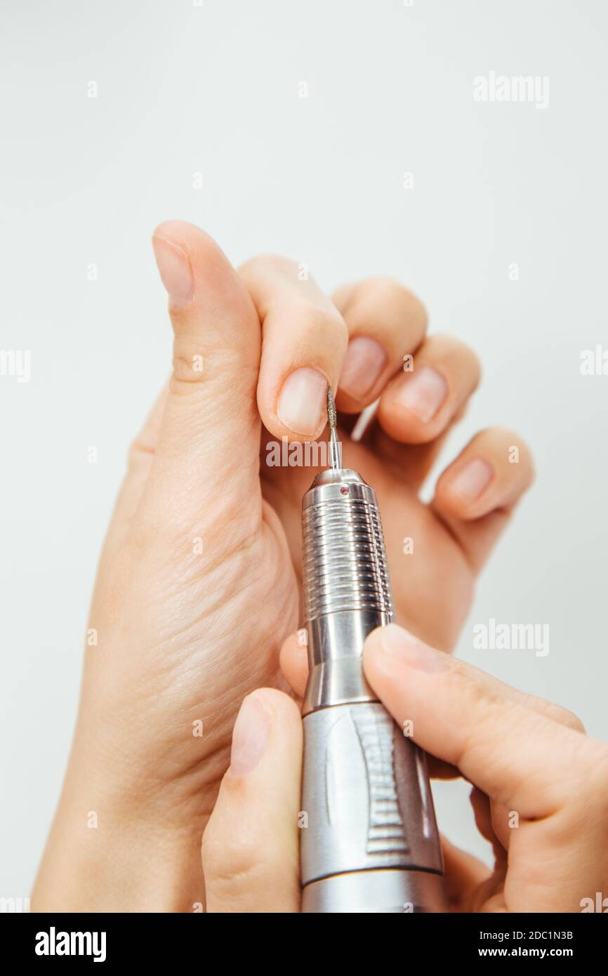 Manicure milling cutter closeup cuticle remover. The manicure machine