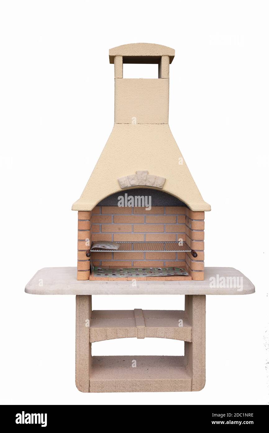 Outdoor fireplace / barbecue grill made from bricks and cement Stock