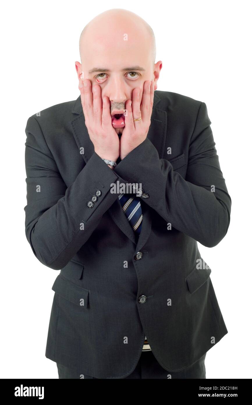 Businessman in a suit gestures with a headache, isolated Stock Photo