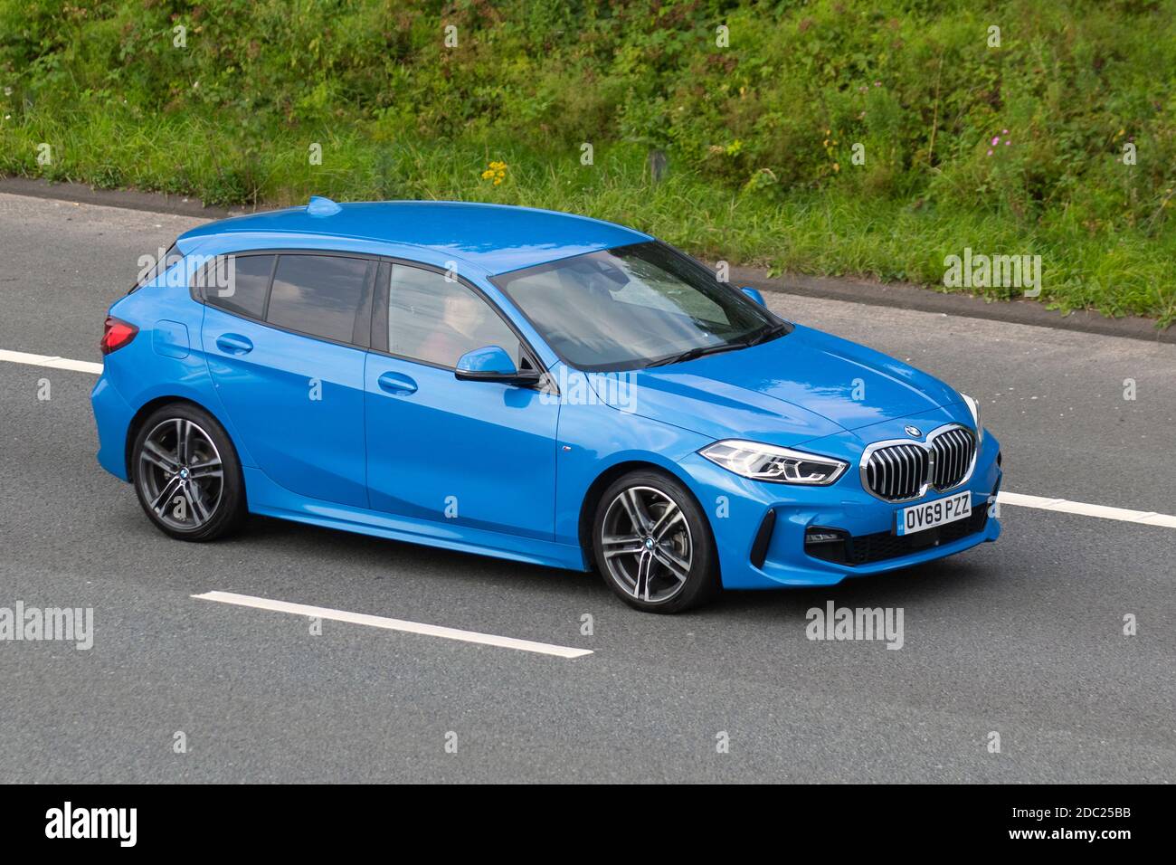 2019 blue BMW 118D M Sport Auto; Vehicular traffic, moving vehicles ...