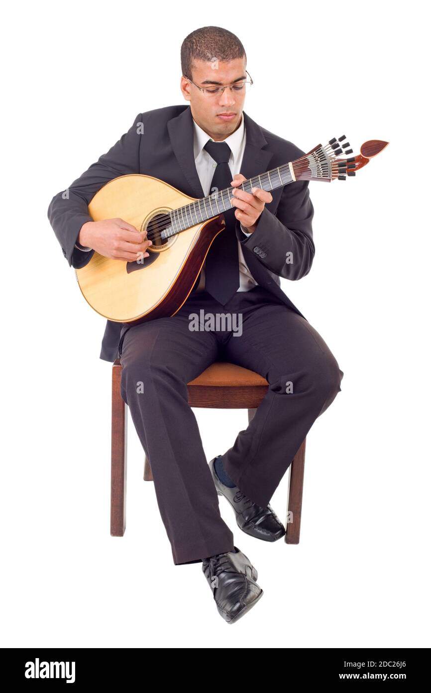 man playing a portuguese guitar, full length, isolated Stock Photo