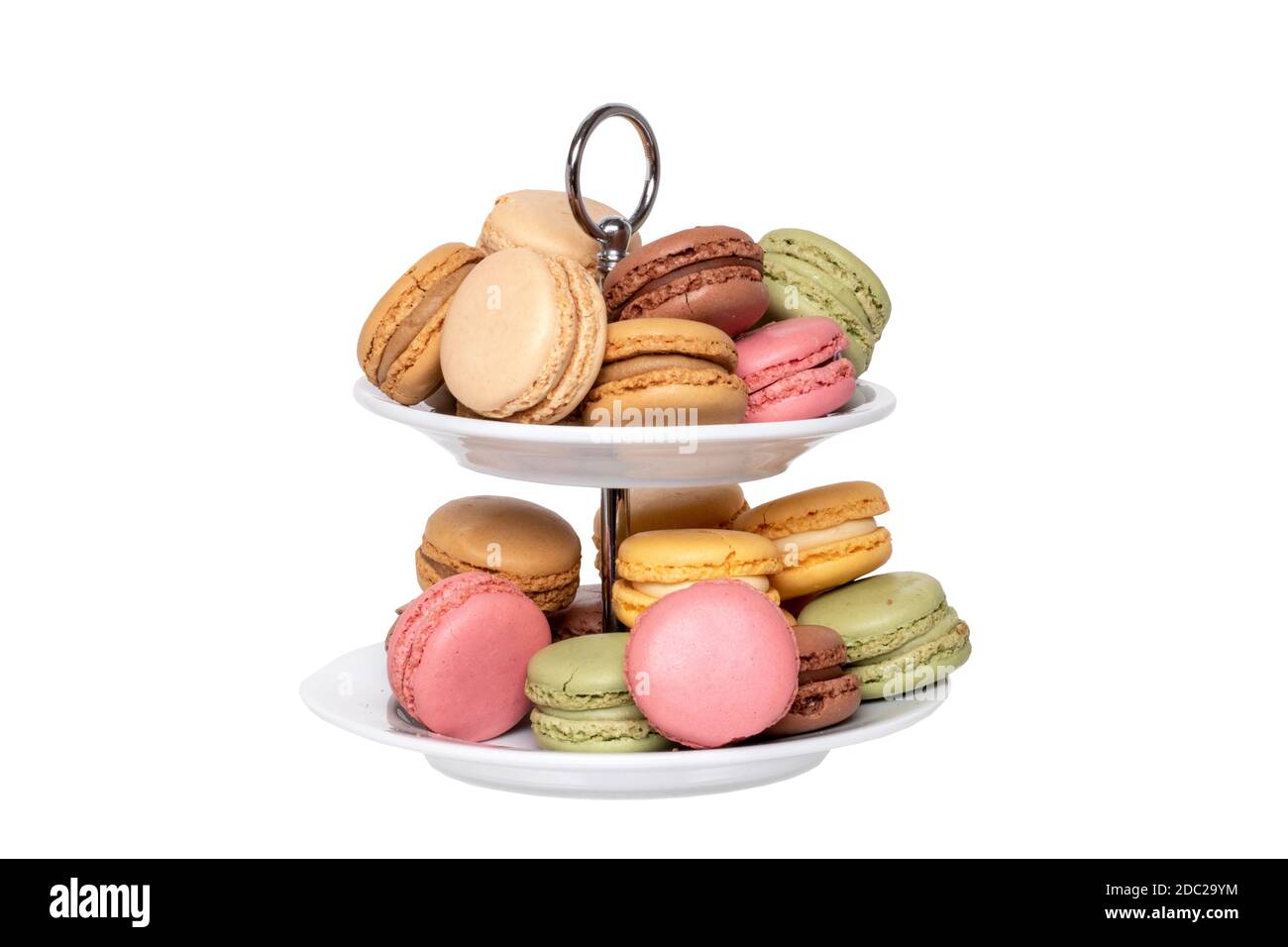 Macaron isolated. Close-up of colourful French macaroons on a two-storey  etagere isolated on a white background. Pastries, desserts and sweets.  Macro Stock Photo - Alamy