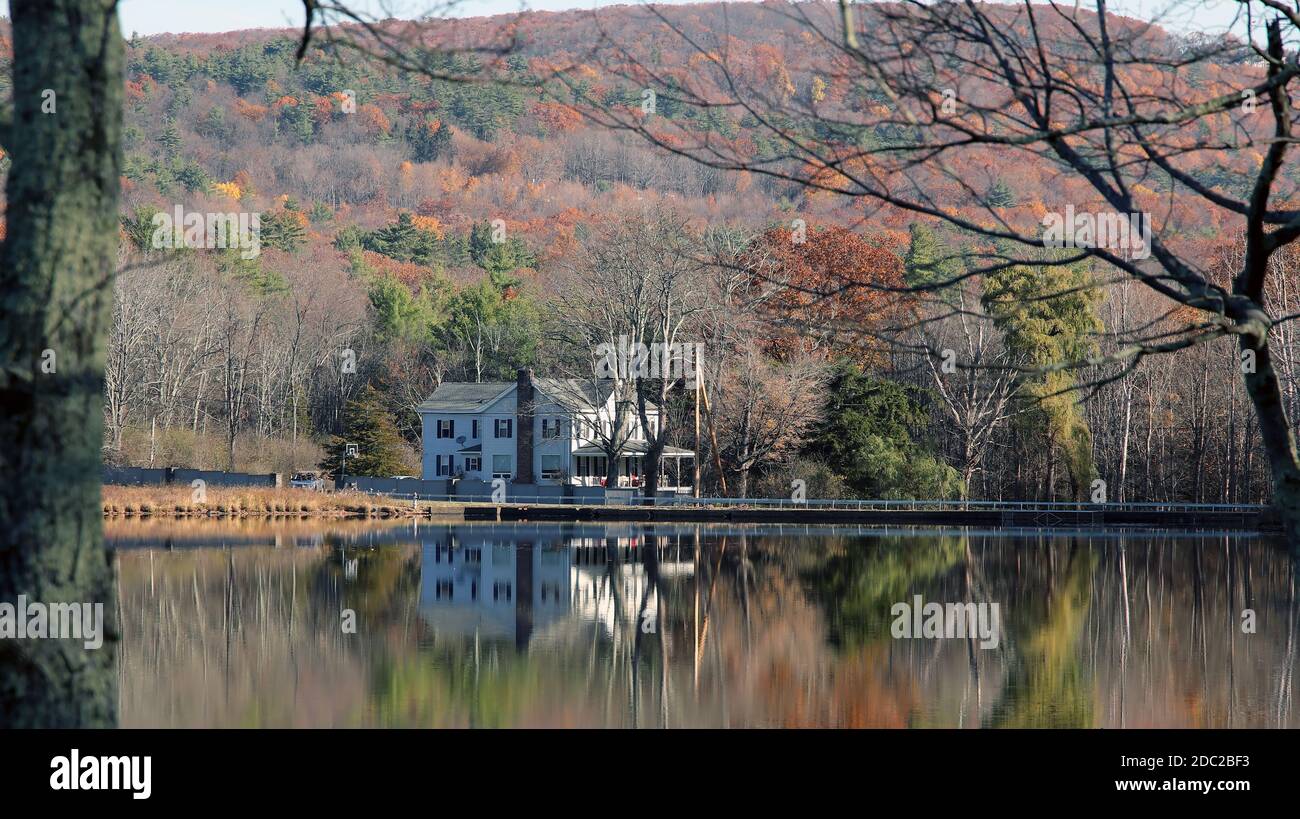 House on a river bank Stock Photo - Alamy