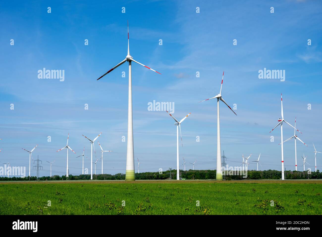 Modern wind turbines in a rural area in Germany Stock Photo