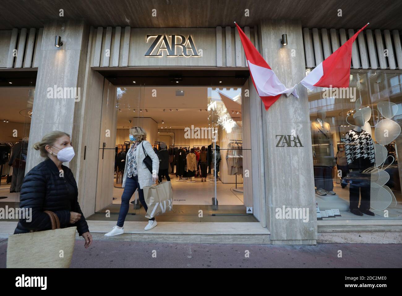 A customer, wearing a protective face mask, leaves a Zara shop in Monte  Carlo during the coronavirus disease (COVID-19) outbreak in Monaco,  November 18, 2020. REUTERS/Eric Gaillard Stock Photo - Alamy