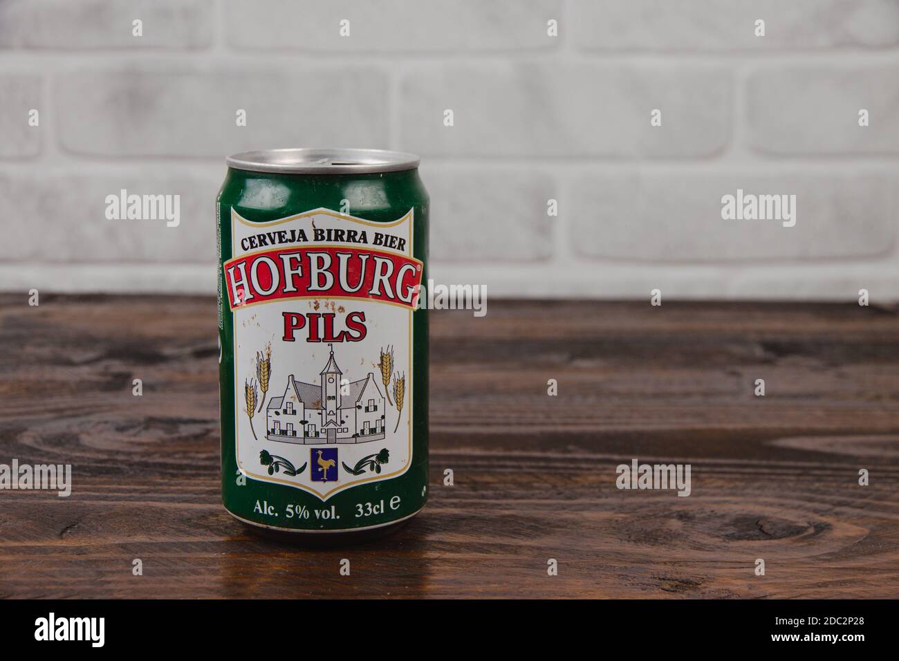 An old aluminium can of Hofburg Netherlands beer against the brick wall Stock Photo