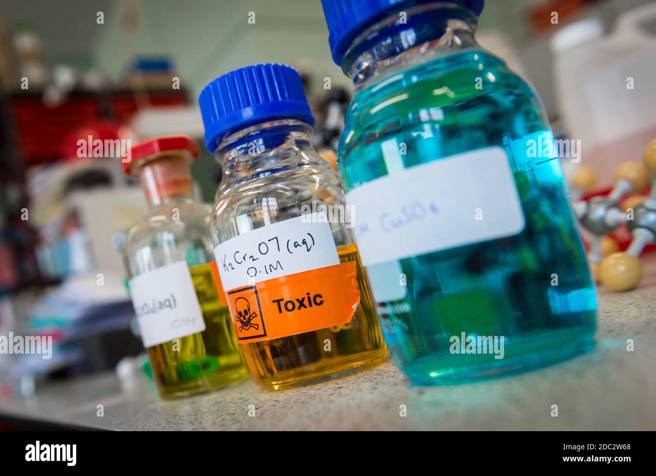 Bottles in a science laboratory in a college in England, UK Stock Photo