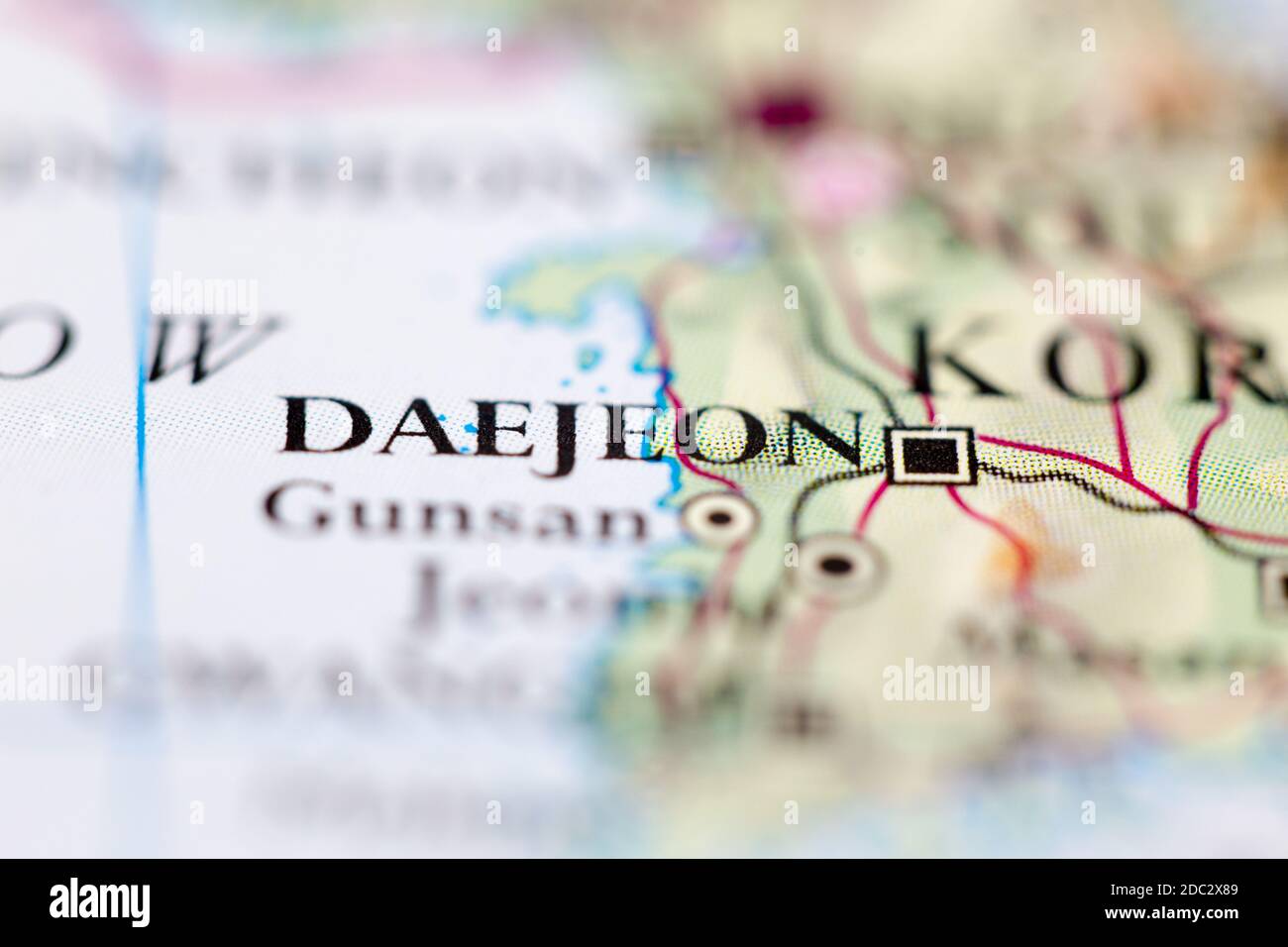 Shallow depth of field focus on geographical map location of Daejeon South Korea Asia continent on atlas Stock Photo