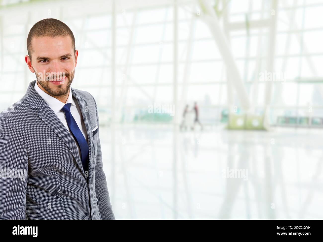 young happy businessman portrait at the office Stock Photo - Alamy