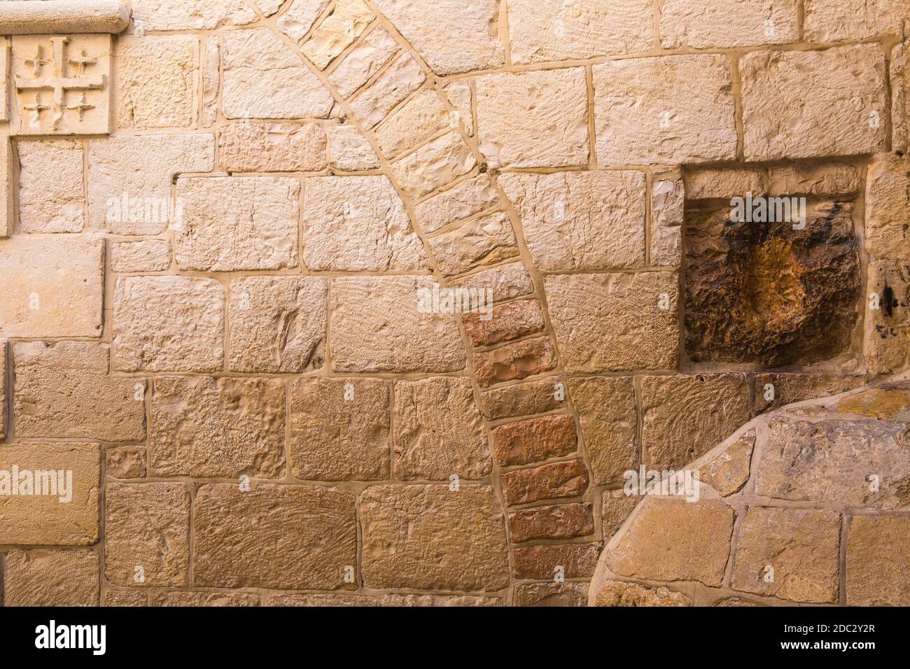 Israel, Jerusalem, Via Dolorosa - 5th station An old square stone, has a cavity which is said to be the imprint of Jesus hand Stock Photo