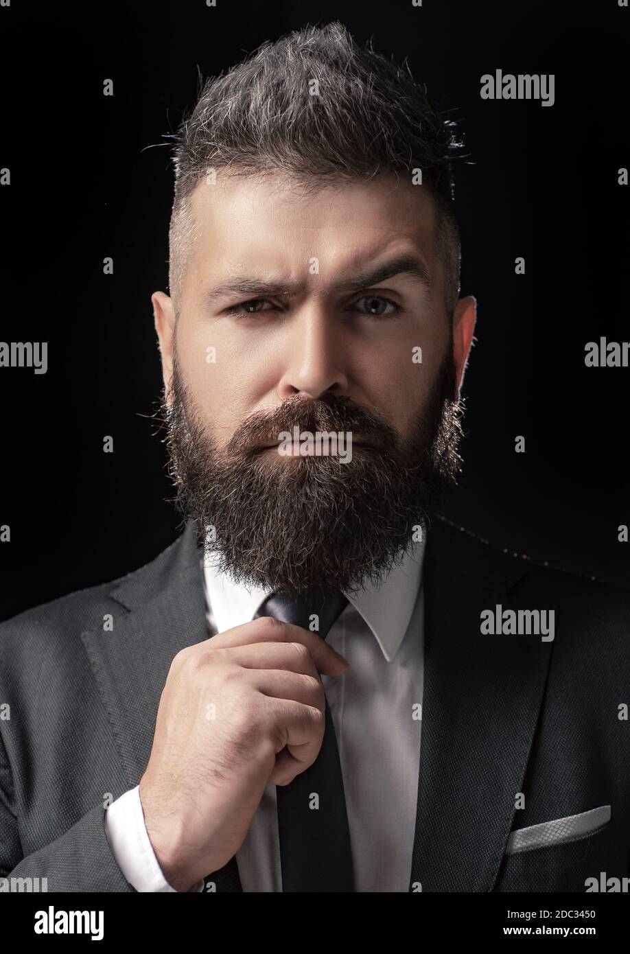 Classic costume and trend. Rich bearded man dressed in classic suits