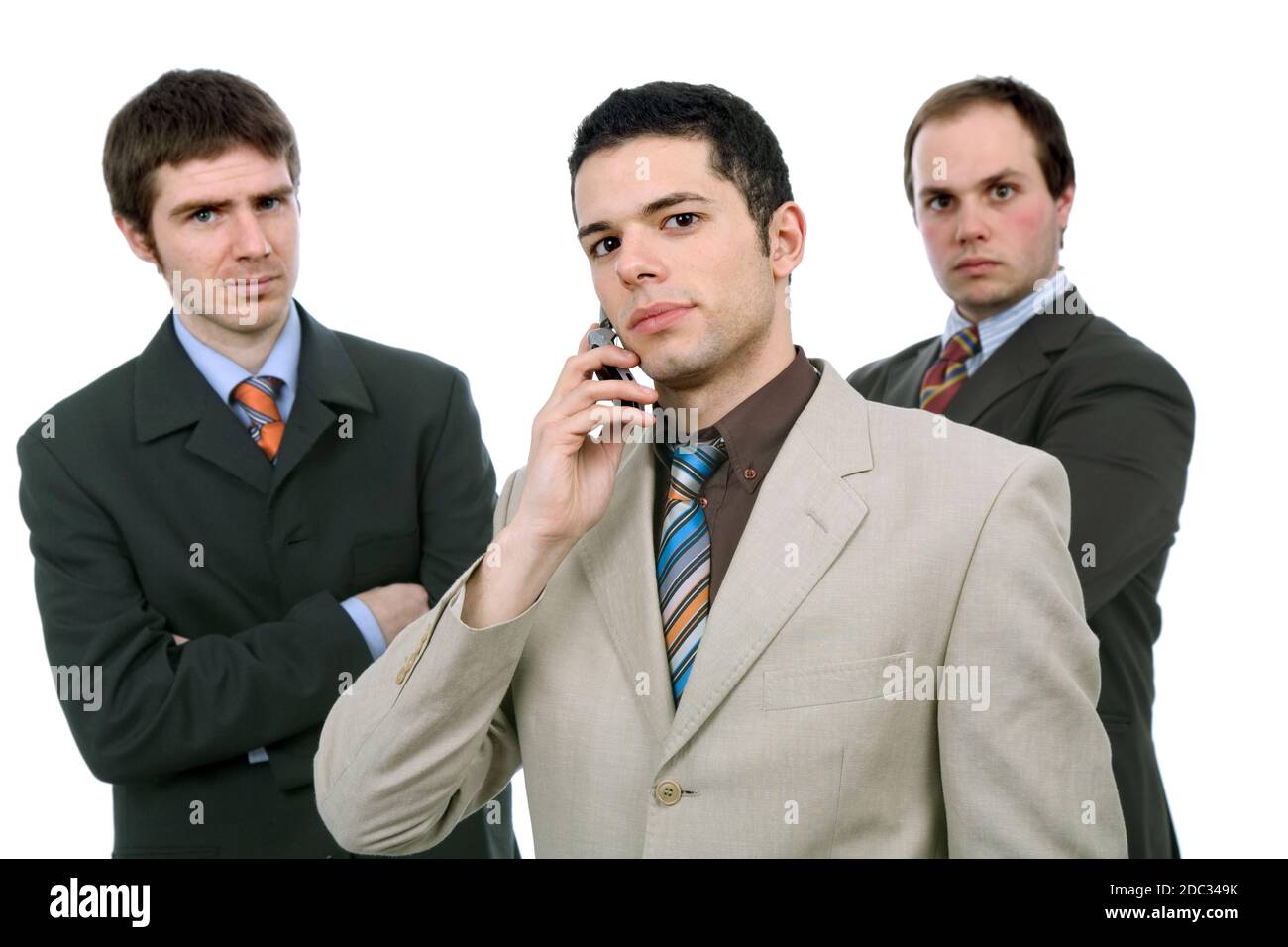 three business man isolated on white background Stock Photo - Alamy