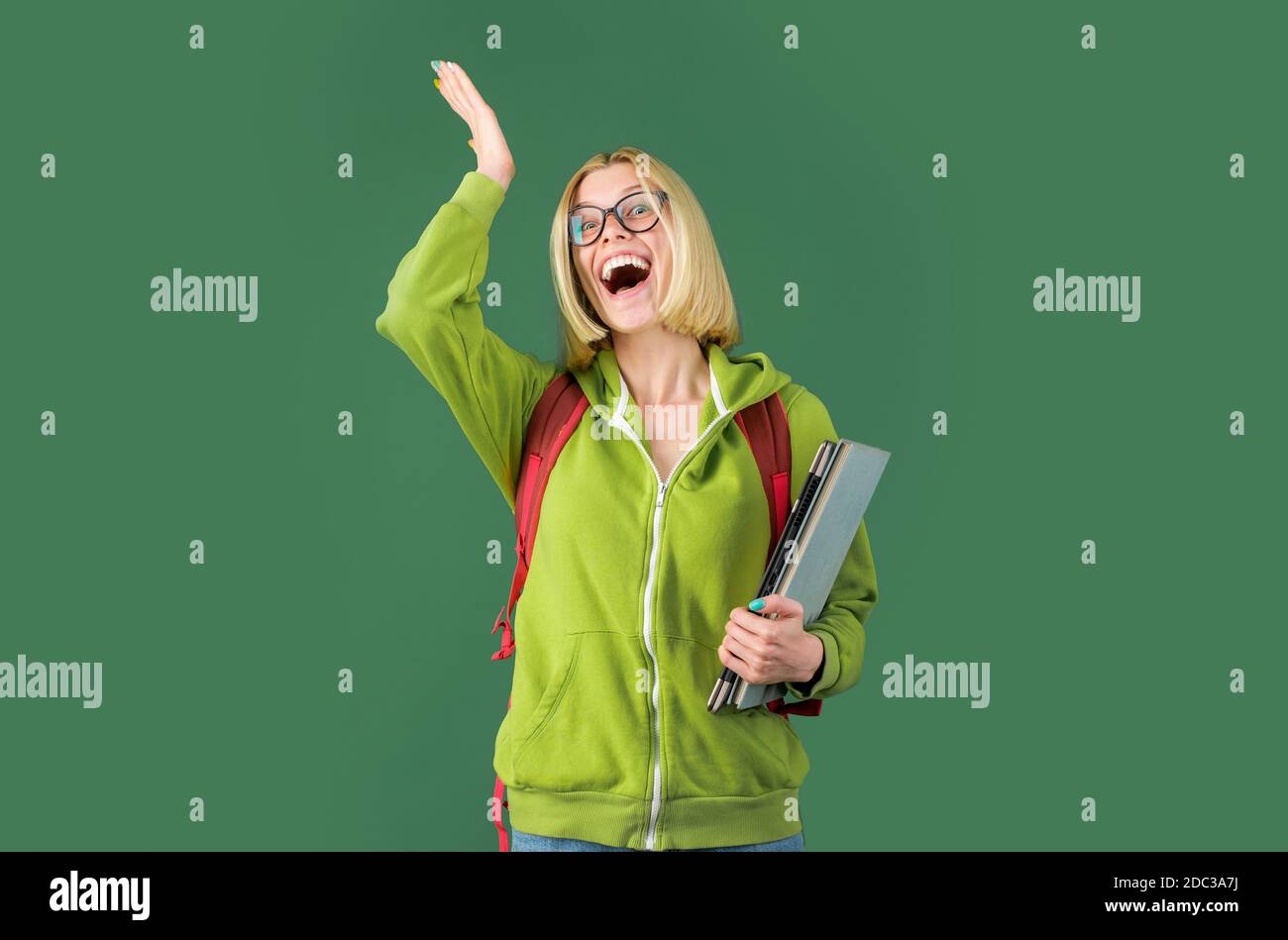 Portrait of confident young Caucasian female teacher. Student preparing ...