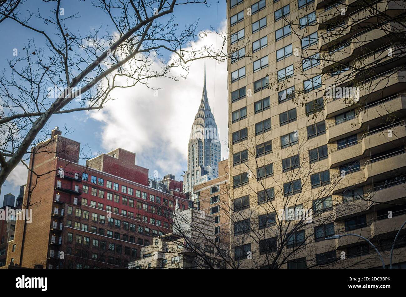 Art Deco Chrysler Building Amongst Other Buildings and Skyscrapers in Manhattan. New York City, USA Stock Photo