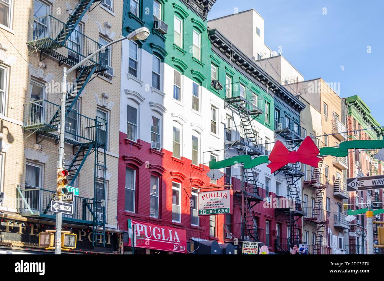 Beautiful Little Italy Neighborhood in Lower Manhattan. Typical NYC Buildings Painted with Striped Italian National Flag Colors. New York City, USA Stock Photo