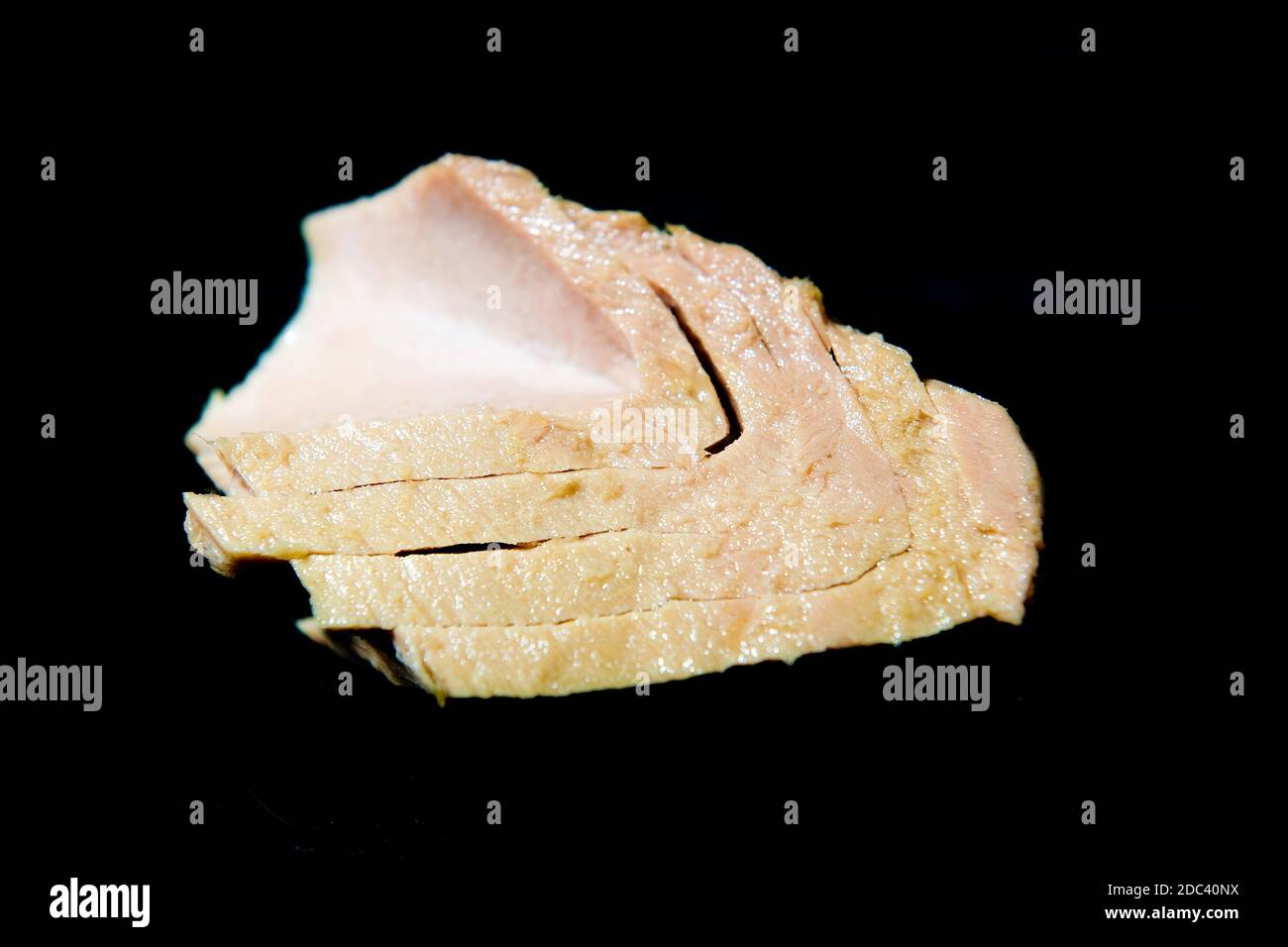 Italian tuna steak on a black background with copy space Stock Photo