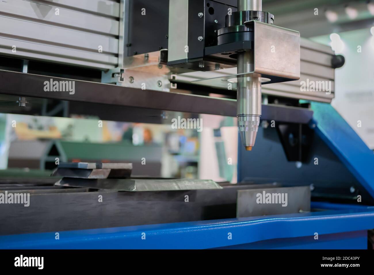 Plasma cutting machine working with sheet metal at metalworking