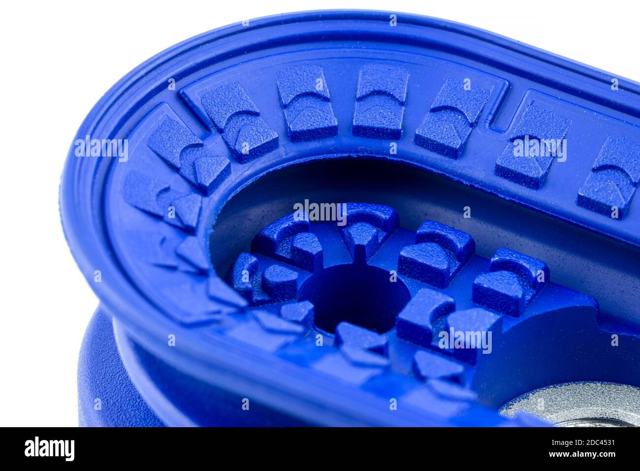 Macro shot of a blue bellows suction cup used in the robotic industry, isolated on a white background. Stock Photo