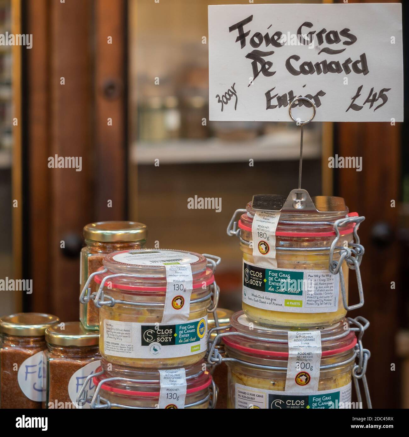 LONDON, UK - JANUARY 24, 2020:  Jars of  Foie Gras De Canard for sale on a delicatessen Stall at a food market Stock Photo