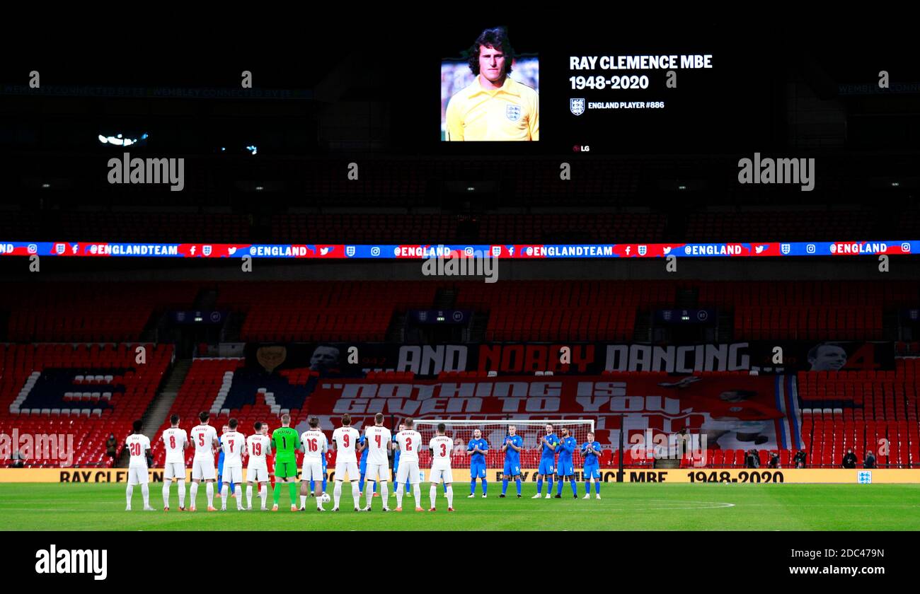 Players stand for a moment of applause in memory of former England goalkeeper Ray Clemence, who died earlier this week, before the UEFA Nations League Group A2 match at Wembley Stadium, London. Stock Photo
