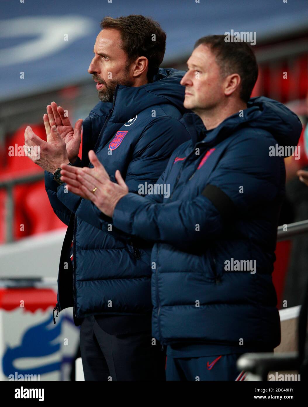 England manager Gareth Southgate (left) and assistant Steve Holland before the UEFA Nations League Group A2 match at Wembley Stadium, London. Stock Photo