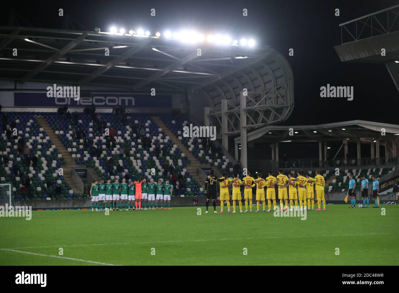 Northern Ireland and Romania pause for a minutes silence to remember the victims of a fire in a hospital in Piatra Neamt, Romania on Saturday 14th November prior to the UEFA Nations League match at Windsor Park, Belfast. Stock Photo
