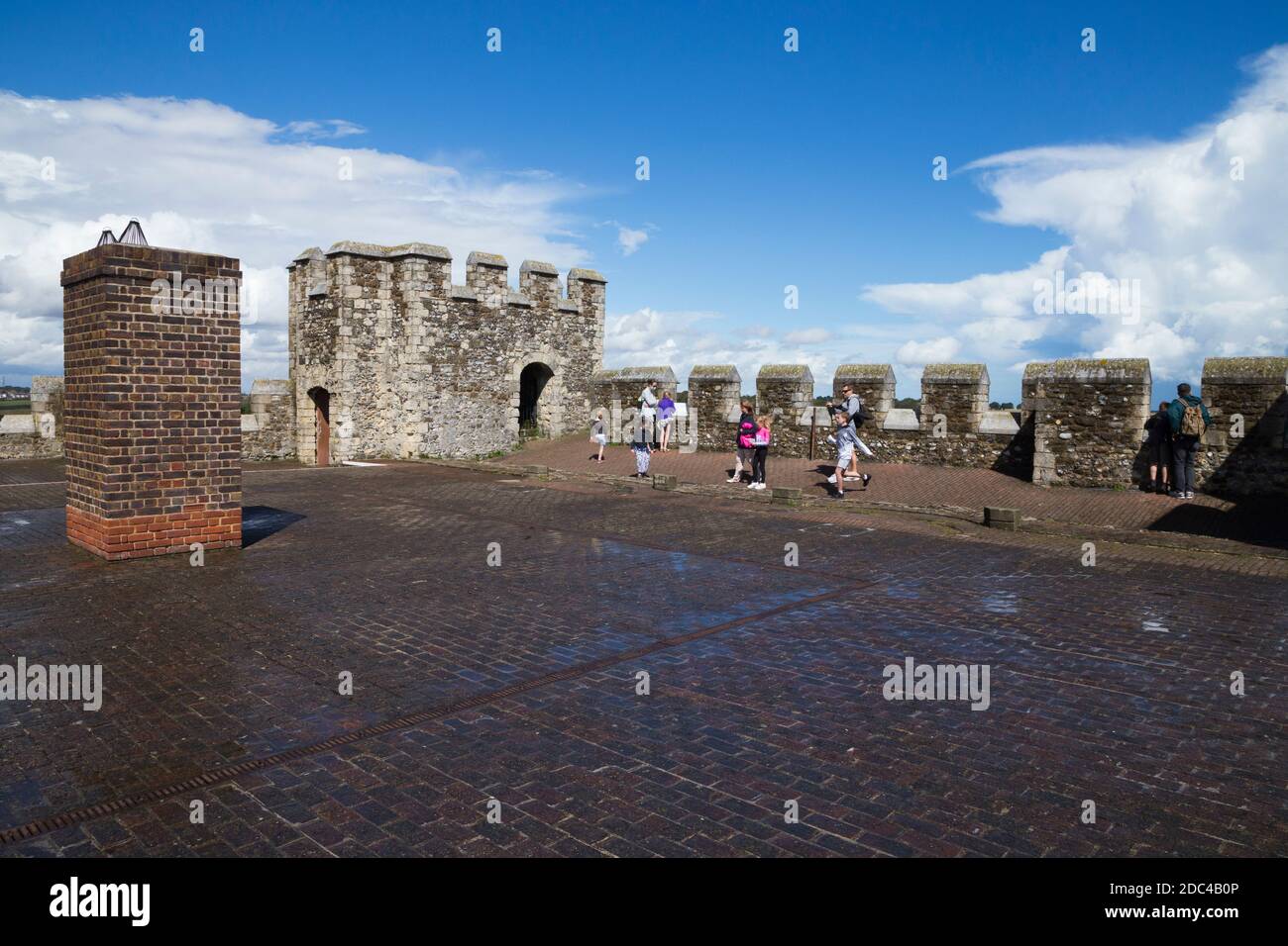 The roof and corner tower with castellated walls at the top of the