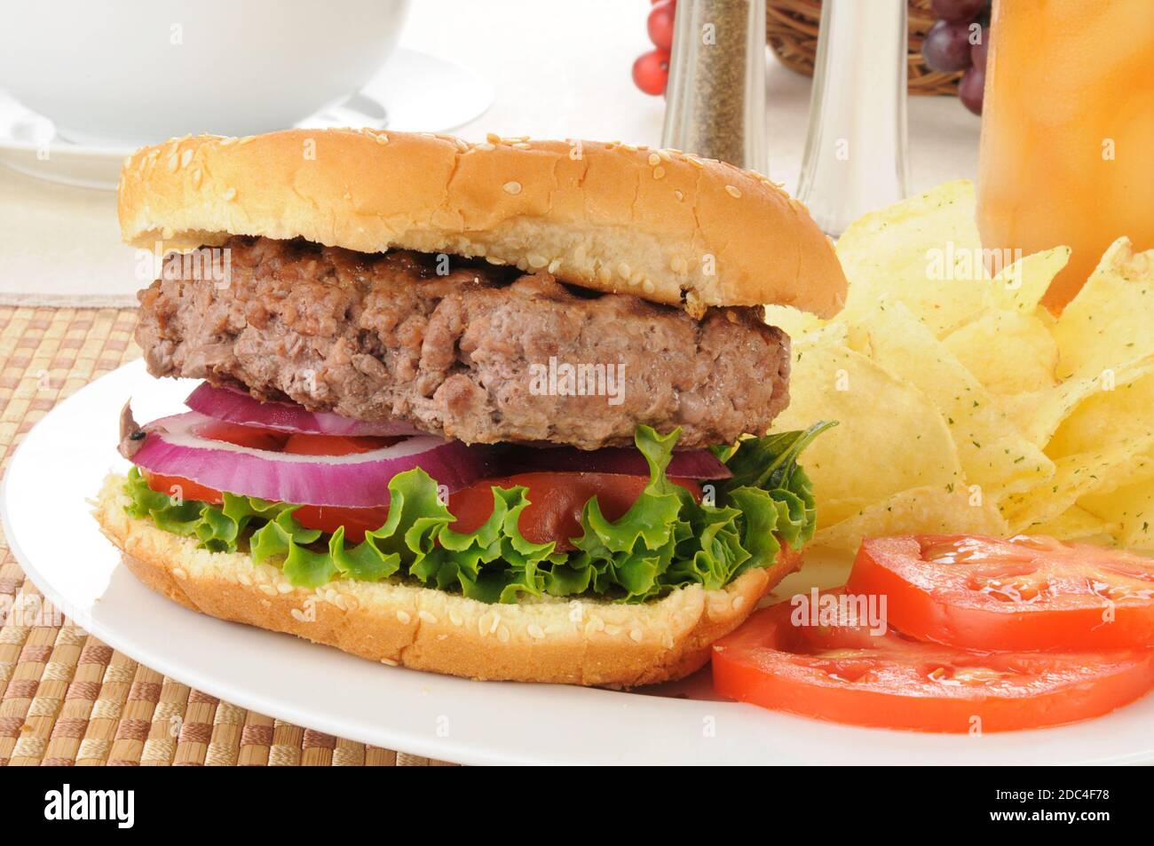 Home cooked hamburger withh potato chips Stock Photo Alamy