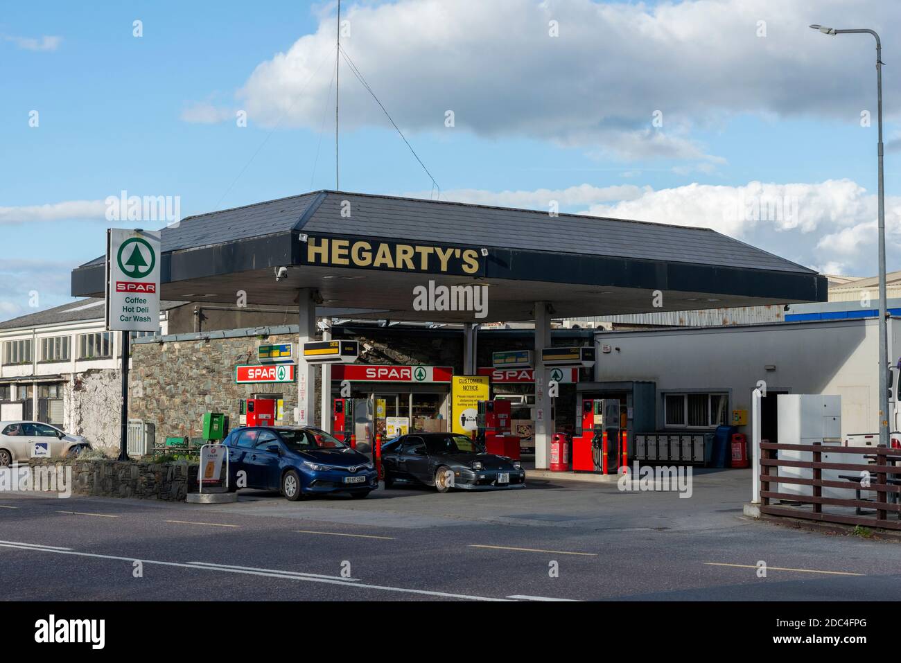 Hegarty's filling station or gas station or petrol station and Spar store on N71 road on the outskirts of Killarney County Kerry Ireland Stock Photo